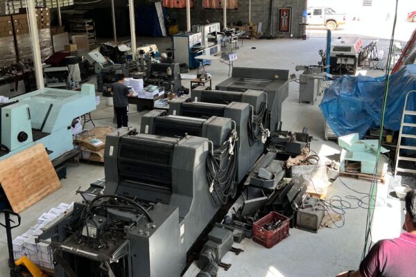 Print presses are prepared for operation.